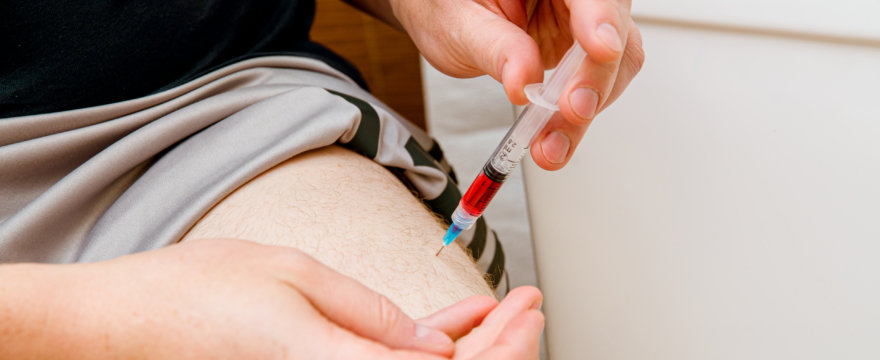 B12 injection to the thigh.